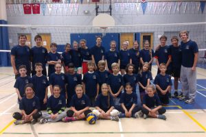 A group of players with their coaches from the Toronto Volleyball Academy